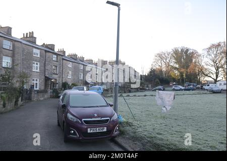 Kendal, Cumbria 8th December 2022. Freezing temperatures of -4 degrees Celsius hit Kendal in Cumbria overnight, causing a harsh frost over the historic town. Car windscreens were covered in ice, steam rose above frozen rooftops and parkland was frozen over after the ‘Troll of Trondheim’ hit many parts of the UK. Credit: Stop Press Media / Alamy Live News Stock Photo