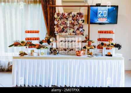 Ivano-Frankivsk, Ukraine October 2, 2021: Festive table snacks and drinks, food and drinks, wedding snacks. Stock Photo