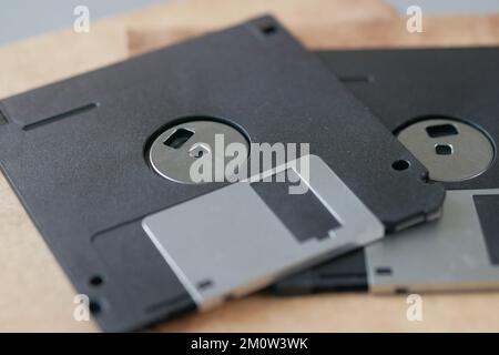 an old vintage floppy disk on a gray background. Stock Photo