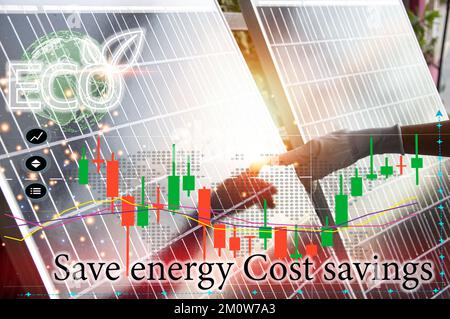 The concept of using clean energy such as solar cells, saving energy, saving costs. Stock Photo