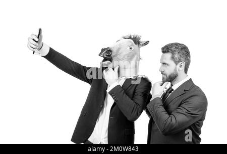 Live streaming with your phone. Employees take selfie with smartphone. Mobile live streaming Stock Photo