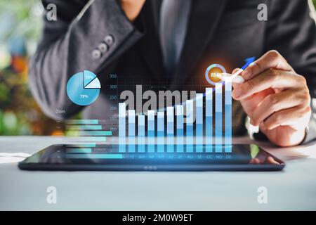 Businessman showing result of growth company profit planning, opportunity, challenge and business strategy graphs and target of success. Stock Photo