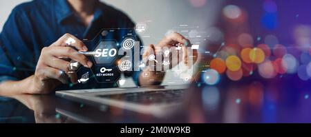 IT specialist person manage search engine optimization : SEO with social media content and advertisement from website. Stock Photo