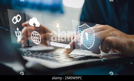 IT specialist work on computer with data protection of cyber security Privacy business internet technology concept. Stock Photo
