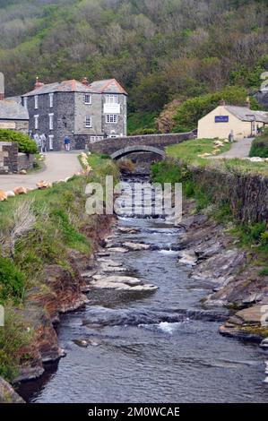 The River Valency Flowing into the Harbour in Boscastle on the South West Coastal Path in Cornwall, England, UK. Stock Photo