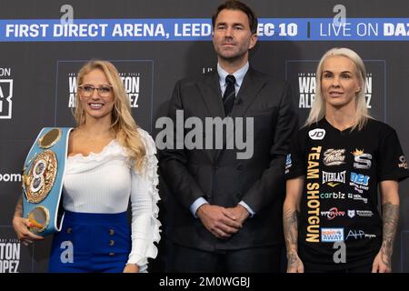 Leeds, UK. 08th Dec, 2022. The Banking Hall, Aspire, Infirmary Street, Leeds, West Yorkshire, 8th December 2022. Boxing promoter Eddie Hearn looks on as Ebanie Bridges (left) and Shannon O'Connell face off during the Josh Warrington vs Luis Alberto Lopez   Undercard Press Conference Credit: Touchlinepics/Alamy Live News Stock Photo
