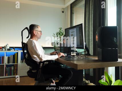 Man working from home. Stock Photo