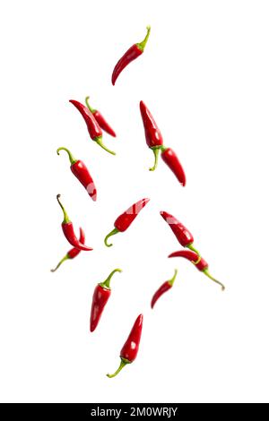 Fresh red chilli peppers floating in the air. food levitation. Falling ...