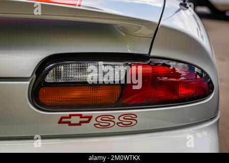 Des Moines, IA - July 03, 2022: Close up detail view of a 1997 Chevrolet Camaro SS taillights at a local car show. Stock Photo
