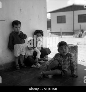 Poor children at Villa Miseria (Misery Village) at Buenos Aires outskirts, circa 1960 Stock Photo