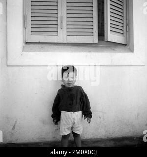 Poor children at Villa Miseria (Misery Village) at Buenos Aires outskirts, circa 1960 Stock Photo