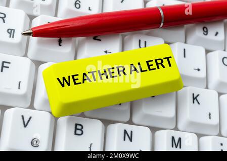 Hand writing sign Weather Alert, Word for urgent warning on the state of the atmosphere at a place and time Stock Photo