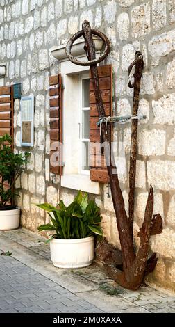 The details of exterior of an old stone house on Lopud Island in Croatia Stock Photo