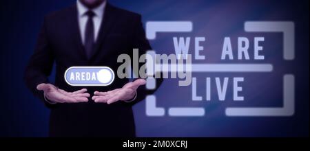 Text caption presenting We Are Live, Word Written on continuous report or chat that is streamed in real time Stock Photo