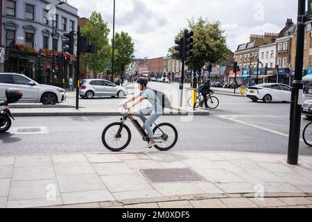 Man on Eco bike in London Stock Photo