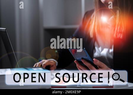 Hand writing sign Open Source. Business concept denoting software which original source code freely available Stock Photo