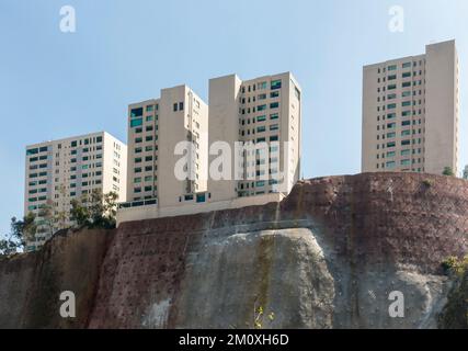 High-rise buildings perched atop of reinforced cliff Santa Fe, Mexico City, Mexico Stock Photo