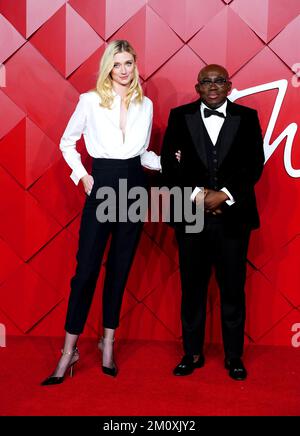 Elizabeth Debicki (left) and Edward Enninful attending the Fashion Awards 2022 held at the Royal Albert Hall, Kensington Gore, London. Picture date: Monday December 5, 2022. Stock Photo