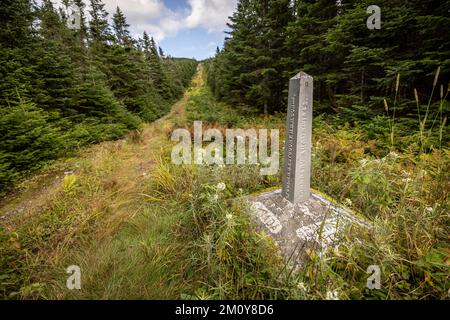 Obelisk along international boundary separates USA from Canada Stock Photo