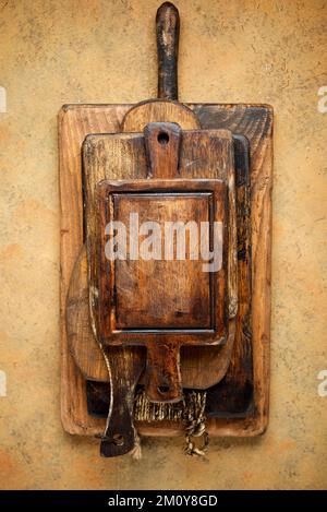 Stacked kitchen cutting boards view. Stock Photo