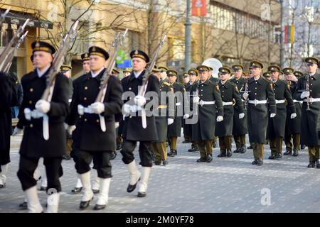 VILNIUS, LITHUANIA - MARCH 11, 2022: Festive parade as Lithuania marked the 32th anniversary of its independence restoration. Parade participants carr Stock Photo