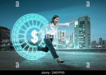 Asian businesswoman running from virtual money with a cityscape background Stock Photo