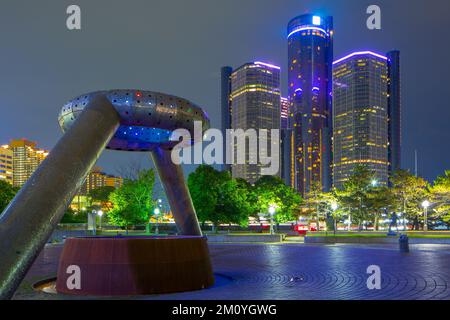 A night view of the Horace E. Dodge and Son Memorial Fountain, the General Motors (GM) world headquarters and the Renaissance Center in Hart Plaza, De Stock Photo