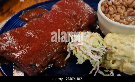 a close up of a plate of BBQ food Stock Photo