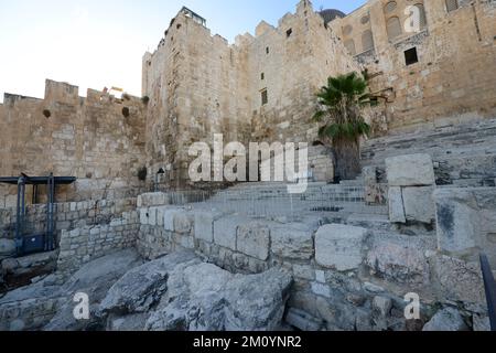 The western (double) Huldah Gate and the monumental staircase at the The southern wall of the Temple Mount in the archeological park in Jerusalem. Stock Photo