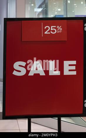 25 percent off in white letters on a red background. Business concept, the text is written - 25 percent OFF SALE. Nobody, selective focus Stock Photo