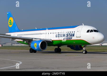 Uzbekistan Airways Express Airbus A320 airplane taxiing at Tashkent Airport in Uzbekistan. Aircraft of Uzbekistan Express. Plane registered as UK32012 Stock Photo