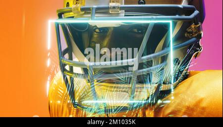 Close-up of illuminated rectangle and plants over portrait of american football player in helmet. Composite, african american, face, eye, protection, Stock Photo