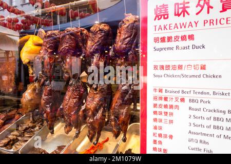 Aromatic Chinese crispy duck on display in a shop window in China Town,Soho, London, England, UK. Stock Photo