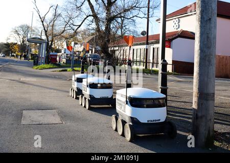 Coop Grocery delivery bots delivering groceries in Adel, Leeds. - A three month trial. Awaiting to be loaded at the Coop shop Stock Photo