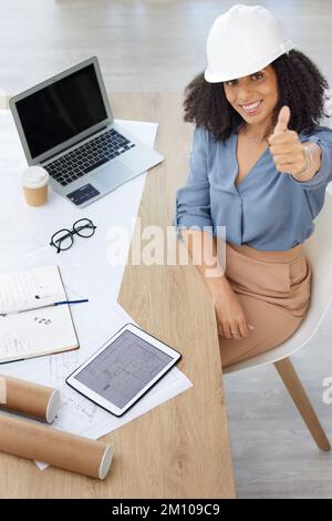 Thumbs up, portrait and success architecture woman on laptop, project planning and engineering strategy goals. Trust, like or yes hand sign and face Stock Photo