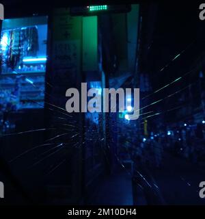 A closeup shot of a broken glass in the darkness Stock Photo