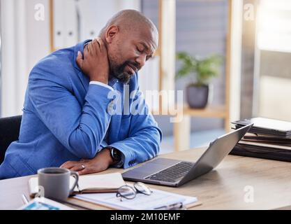 Black man , stress and tired burnout with neck pain in the office due to bad posture and uncomfortable chair. Fatigue, problem or frustrated worker Stock Photo