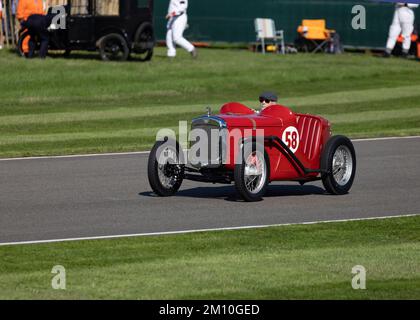 A red Austin Seven sports racing car at the 2022 Goodwood Revival Stock Photo