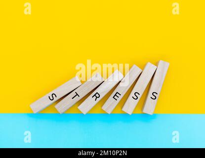 Stress - word from wooden blocks with letters, great worry caused by a difficult situation stress concept Stock Photo