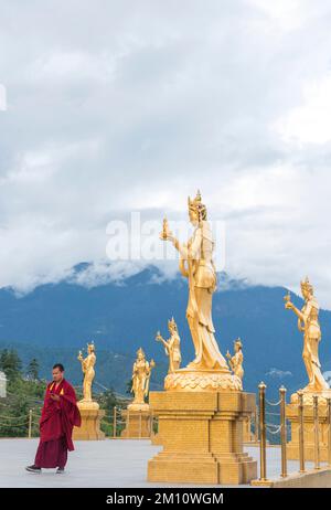 Golden Statues of Buddhist Female Gods at Buddha Dordenma Temple, Thimphu, Bhutan Stock Photo