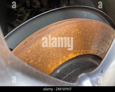 car brake disc and pad rusted after the rain Stock Photo