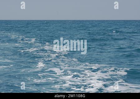 Waves and blue sky from the sea. Stock Photo