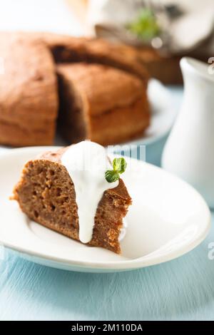 Chocolate brownie, simple coffee cake, a side view on a black ...