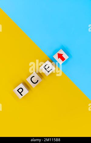 pce, personal consumption expenditure symbol. Wooden blocks with words 'pce' Stock Photo
