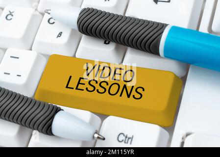 Text caption presenting Video Lessons. Internet Concept Online Education material for a topic Viewing and learning Stock Photo