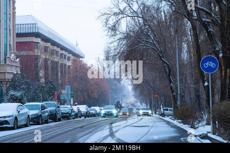 Almaty, Kazakhstan - December 09, 2022 - Snowfall in the city, view of Kunaev street in winter Stock Photo