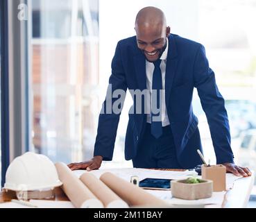 Architect, tablet and man in office, hard hat or smile for success, contract approved or planning. Young black male, entrepreneur or engineer on video Stock Photo