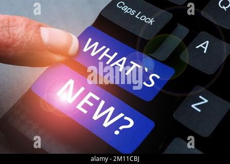 Handwriting text What's New. Word for Asking about latest Updates Trends Happening News Stock Photo