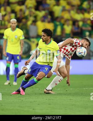 Al Rayyan, Qatar. 9th Dec, 2022. Marquinhos (C) of Brazil competes during the Quarterfinal match between Croatia and Brazil of the 2022 FIFA World Cup at Education City Stadium in Al Rayyan, Qatar, Dec. 9, 2022. Credit: Lan Hongguang/Xinhua/Alamy Live News Stock Photo