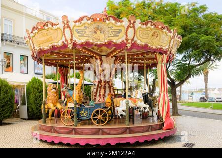 Portugal, Algarve, Lagos, children carousel in the city Stock Photo